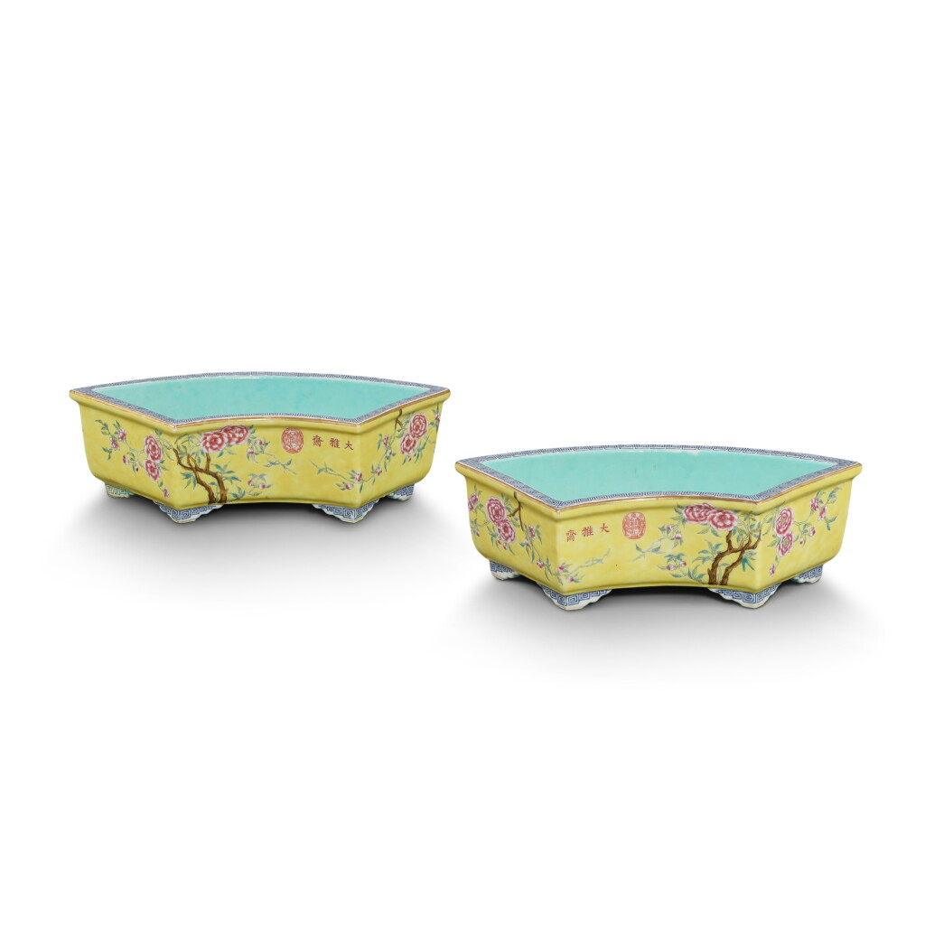 View full screen - View 1 of Lot 3404. A pair of yellow-ground famille-rose 'Dayazhai' narcissus trays, Qing dynasty, Guangxu period | 清光緒 黃地粉彩花卉紋扇形水仙花盆一對 《大雅齋》《天地一家春》《永慶長春》款.
