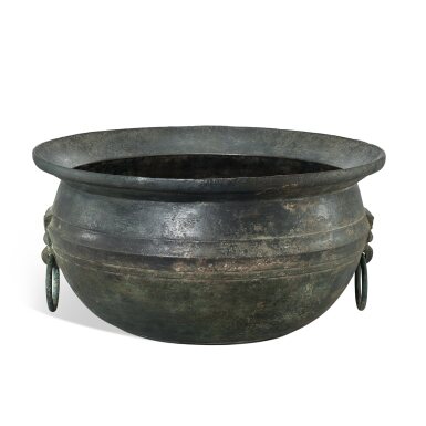 View full screen - View 1 of Lot 3042. A massive inscribed bronze 'fish' basin, Han dynasty | 漢 青銅魚紋「宜壽王」鋪首活環耳鑒.