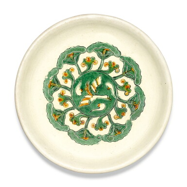 View full screen - View 1 of Lot 207. A RARE SANCAI-GLAZED TRIPOD DISH, TANG DYNASTY | 唐 三彩寳相花紋三足盤.
