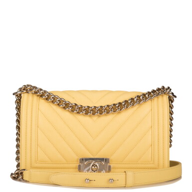 View full screen - View 1 of Lot 98. CHANEL | YELLOW CHEVRON OLD MEDIUM BOY BAG OF CAVIAR LEATHER WITH LIGHT GOLD TONE HARDWARE.