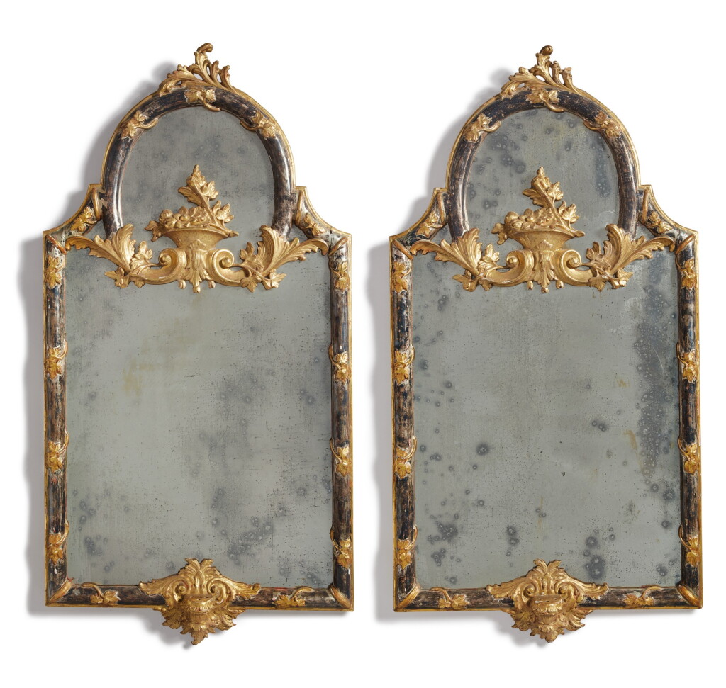 View full screen - View 1 of Lot 111. A PAIR OF ITALIAN EARLY ROCOCO STYLE SILVERED AND GILTWOOD MIRRORS.