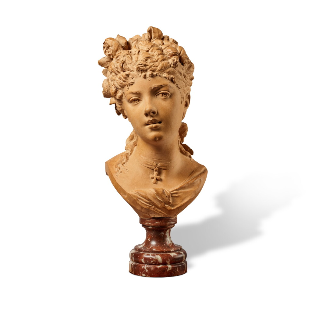 View full screen - View 1 of Lot 123. Buste de jeune femme coiffée de roses et portant une croix autour du cou.