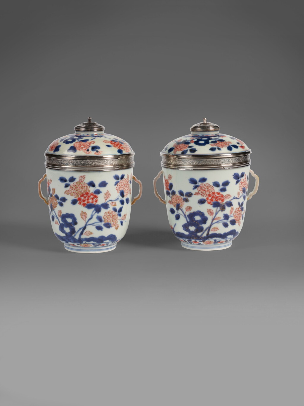 View full screen - View 1 of Lot 502. A Pair of Large Régence Silver-Mounted Imari Porcelain Covered Pots, Paris, 1717-22.