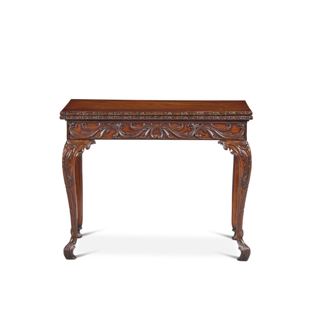 View full screen - View 1 of Lot 50. A George III Carved Mahogany Concertina Action Games Table attributed to Paul Saunders, Circa 1760.