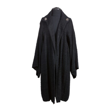 View full screen - View 1 of Lot 86. GEORGIA O'KEEFFE | MID-LENGTH OPEN BLACK COAT.