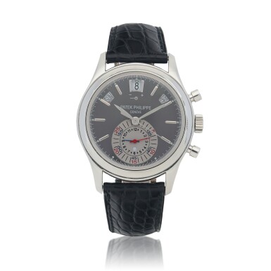 View full screen - View 1 of Lot 489. Ref. 5960P-001 Platinum annual calendar flyback chronograph wristwatch with power reserve and day/night indication Circa 2009.