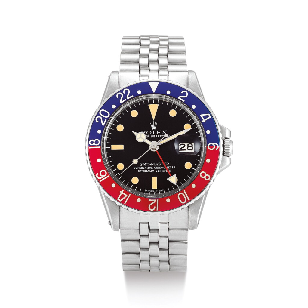 View full screen - View 1 of Lot 2100. ROLEX | GMT-MASTER, REFERENCE 1675 A STAINLESS STEEL DUAL TIME ZONE WRISTWATCH WITH DATE AND BRACELET, CIRCA 1972" | 勞力士 | GMT-Master 型號1675 精鋼兩地時間鏈帶腕錶,備日期顯示,錶殼編號2999896,約1972年製".