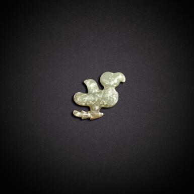 View full screen - View 1 of Lot 5646. A pale celadon jade 'bird' pendant, Neolithic period, Hongshan culture | 新石器時代 紅山文化 青白玉鳥形珮.