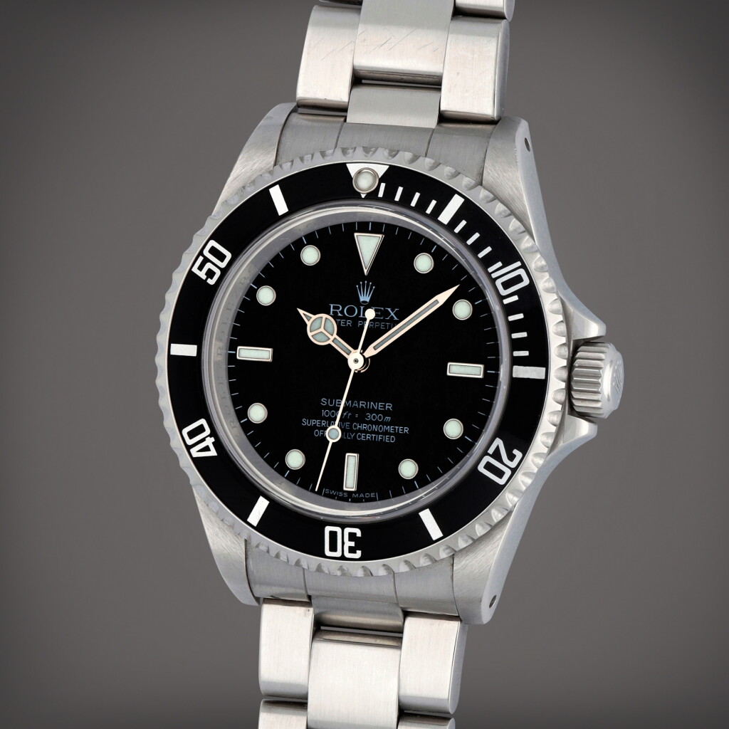 View full screen - View 1 of Lot 211. Submariner, Reference 14060M | A stainless steel wristwatch with bracelet | Circa 2006.