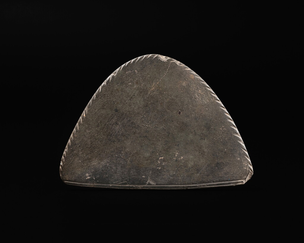 View full screen - View 1 of Lot 128. An Egyptian Greywacke Cosmetic Palette, late Predynastic Period/ 1st Dynasty, circa 3200-2900 B.C..