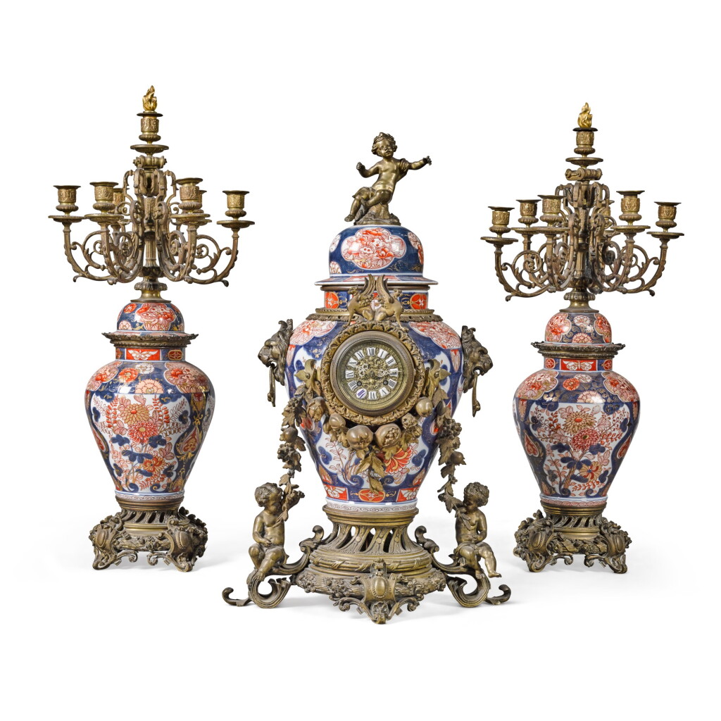 View full screen - View 1 of Lot 59. A FRENCH GILT-BRONZE AND IMARI PORCELAIN THREE-PIECE CLOCK GARNITURE, CIRCA 1880.