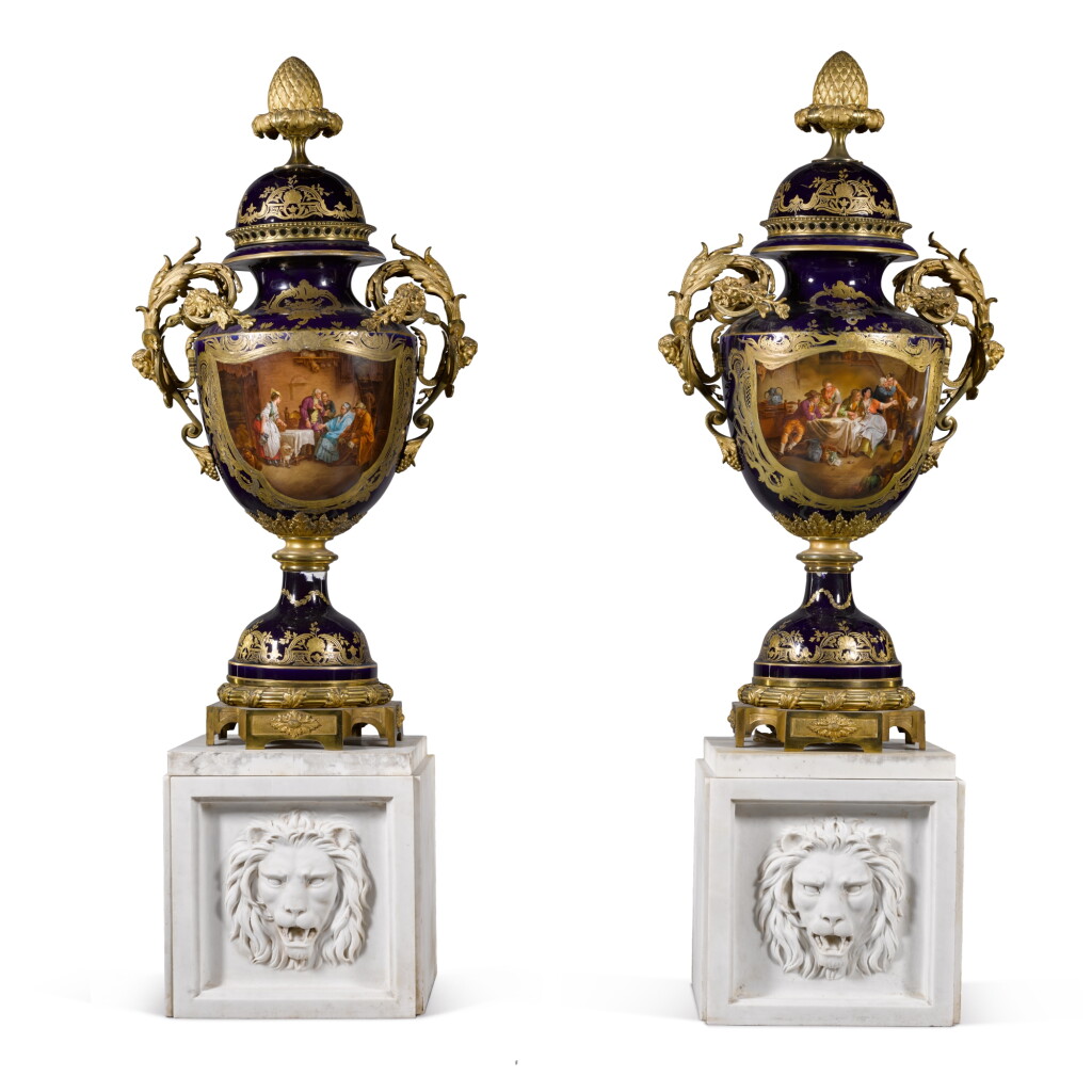 View full screen - View 1 of Lot 66. A pair of Napoleon III gilt-metal-mounted large Sèvres-style blue-ground porcelain vases and covers, late 19th century.