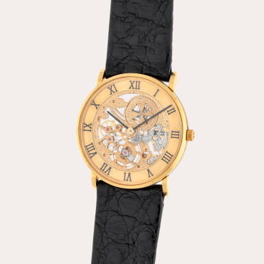View full screen - View 1 of Lot 335. A yellow gold skeletonised wristwatch | Circa 1990.
