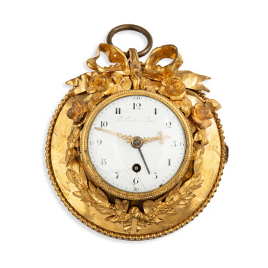 View full screen - View 1 of Lot 1060. A Louis XVI style gilt-bronze clock, 19th century | Pendule en bronze doré de style Louis XVI, XIXe siècle.