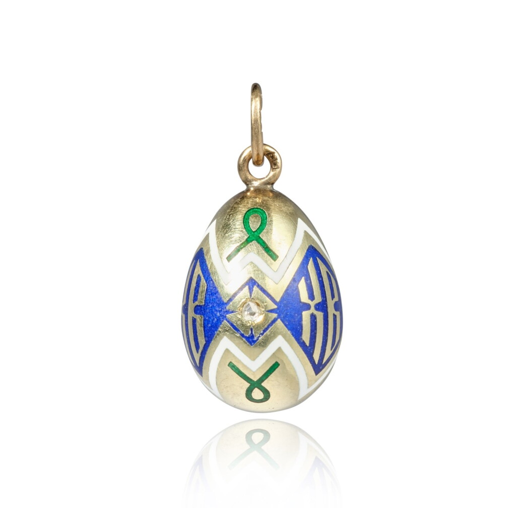 View full screen - View 1 of Lot 1284. A Fabergé gold and champlevé enamel Easter egg pendant, workmaster Erik Kollin, St Petersburg, circa 1890.