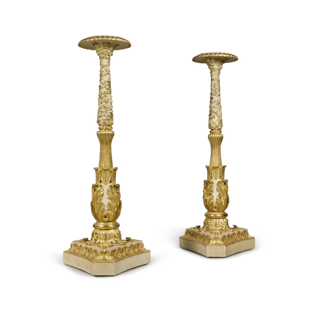 View full screen - View 1 of Lot 191. A Pair of George IV Cream-Painted and Parcel-Gilt Torcheres, circa 1820.