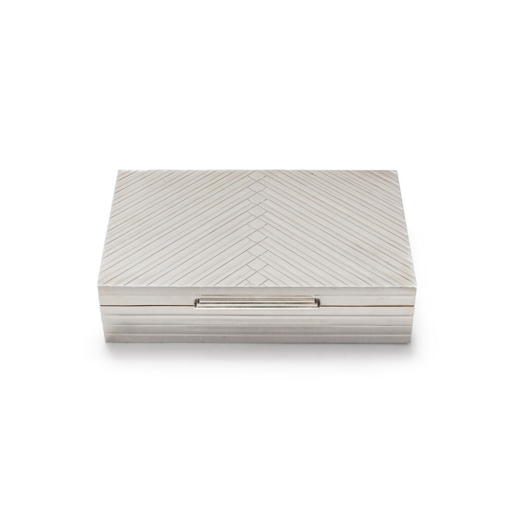 View full screen - View 1 of Lot 31. A silver cigar box, Puiforcat, Paris, circa 1950 | Coffret à cigares en argent par Puiforcat, Paris, vers 1950.