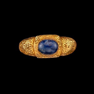 View full screen - View 1 of Lot 1073. A gold and cabochon sapphire repoussé ring Champa, 14th century | 十四世紀 占城 金嵌藍寶石戒指.