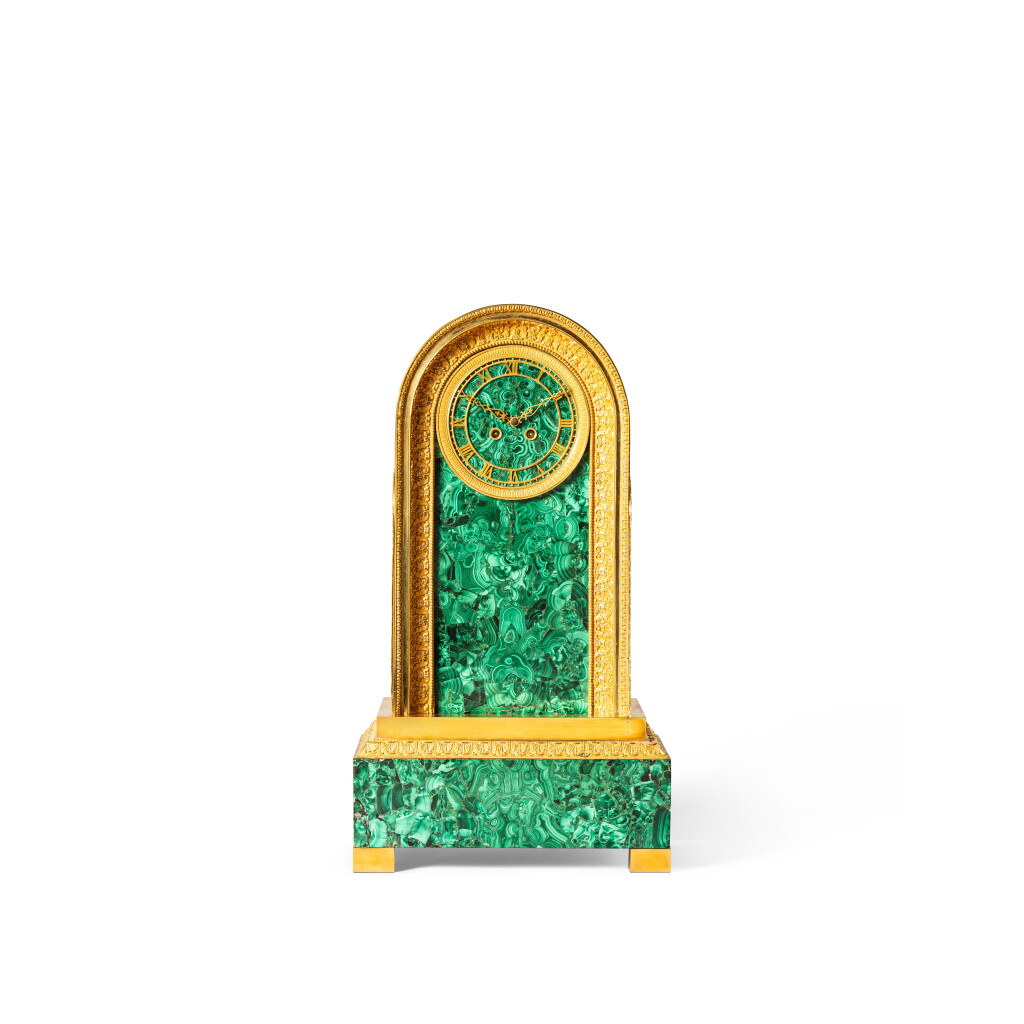 View full screen - View 1 of Lot 137. A Restauration gilt-bronze and malachite mantel clock, circa 1823, after a model by Jean-Jacques Feuchère.