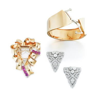 View full screen - View 1 of Lot 44. Pair of convertible diamond clips in bracelet and ruby brooch.
