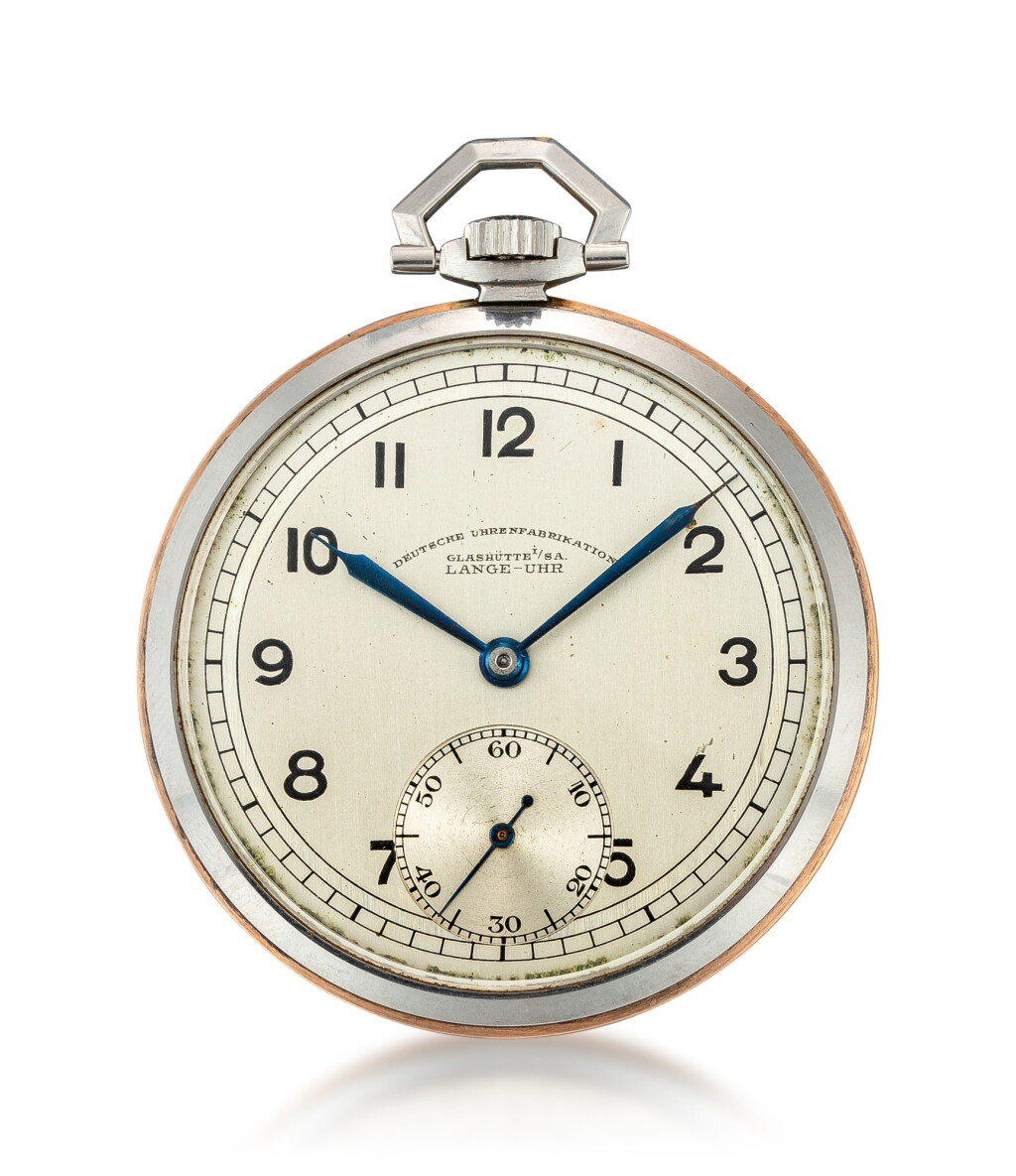 View full screen - View 1 of Lot 111. DEUTSCHE UHRENFABRIKATION LANGE UHR | A STAINLESS STEEL AND PINK GOLD OPENFACE KEYLESS WATCH WITH TWO TONE DIAL, CIRCA 1940.