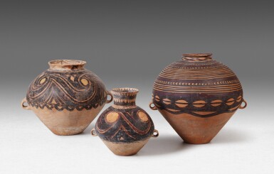 View full screen - View 1 of Lot 31. A group of three painted pottery globular jars Neolithic period, Yangshao culture | 新石器時代 仰韶文化彩陶雙耳罐一組三件.