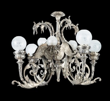 View full screen - View 1 of Lot 12. A silver-plated chandelier, late 19th century | Lustre en métal argenté de la fin du XIXème siècle.