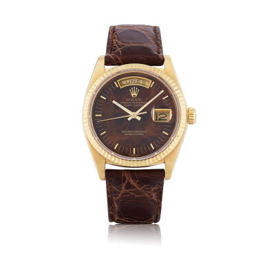 View full screen - View 1 of Lot 261. ROLEX | DAY-DATE, REF 18038 YELLOW GOLD WRISTWATCH WITH DAY, DATE AND WALNUT WOOD DIAL CIRCA 1986.