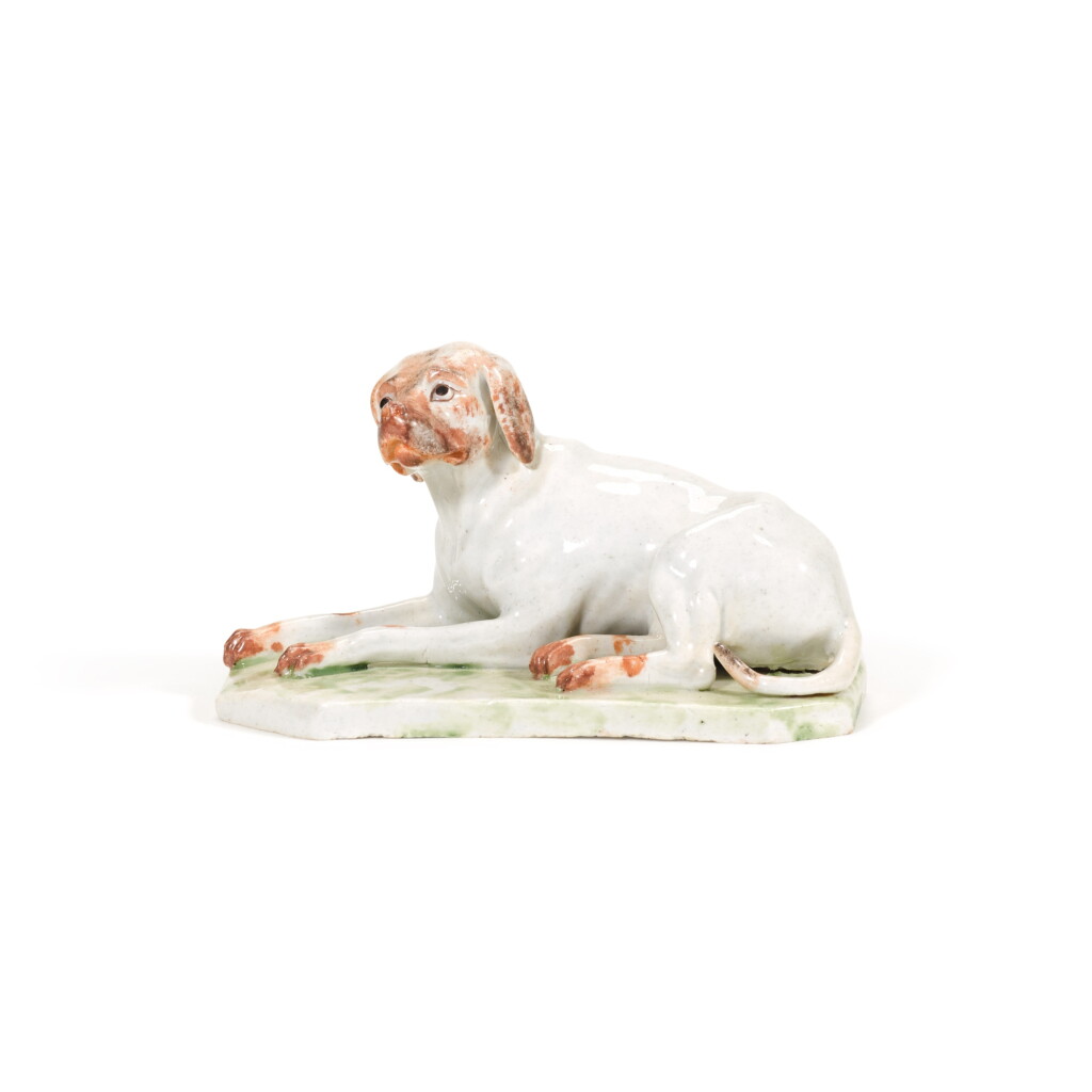 View full screen - View 1 of Lot 169. A Ludwigsburg porcelain model of a recumbent hound, circa 1755-65.