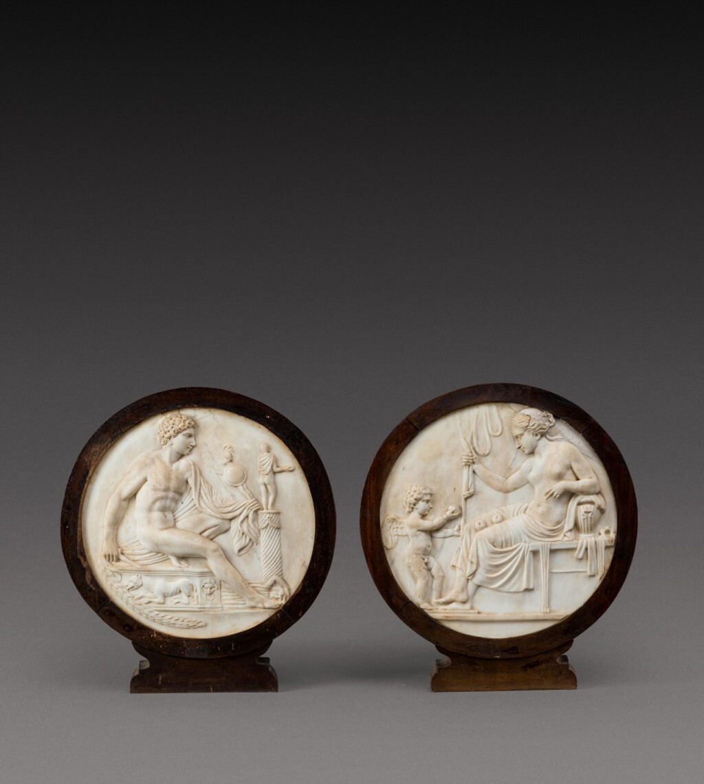 View full screen - View 1 of Lot 114. Italian, 19th century | Pair of Relief Medallions with Venus and Cupid and Mars.