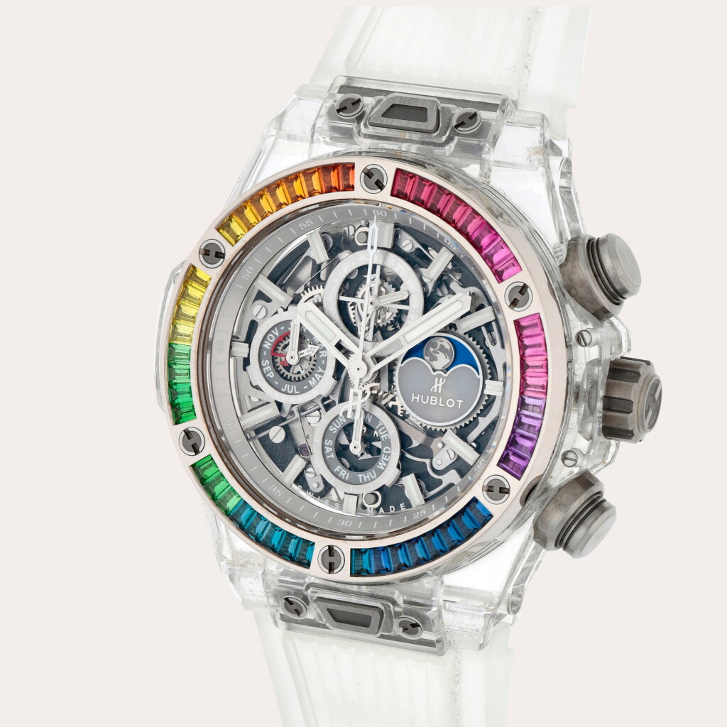 View full screen - View 1 of Lot 83. Big Bang Unico Chronograph Perpetual Calendar Sapphire Rainbow, Reference 406.JX.0120.RT.4099 | A limited edition sapphire crystal, white gold and gem-set semi-skeletonized perpetual calendar chronograph wristwatch moon phases and leap year indication | Circa 2018.
