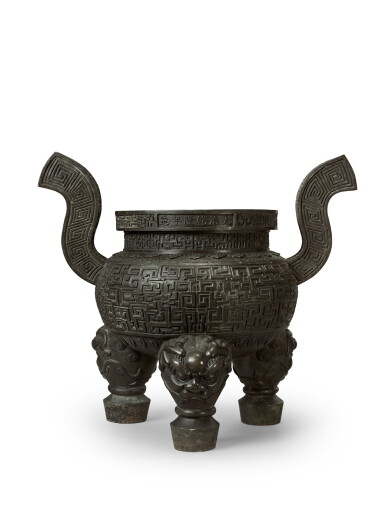 View full screen - View 1 of Lot 3637. A large bronze archaistic tripod incense burner, Mark and period of Qianlong | 清乾隆 銅仿古夔龍紋朝冠耳三足大香爐 《大清乾隆年造》款、「一百七十斤」字.