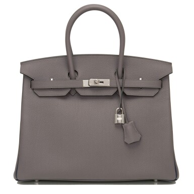 View full screen - View 1 of Lot 66. Hermès Horseshoe Stamped (HSS) Bi-color Etain and Bleu Nuit Birkin 35cm of Togo Leather with Palladium Hardware.