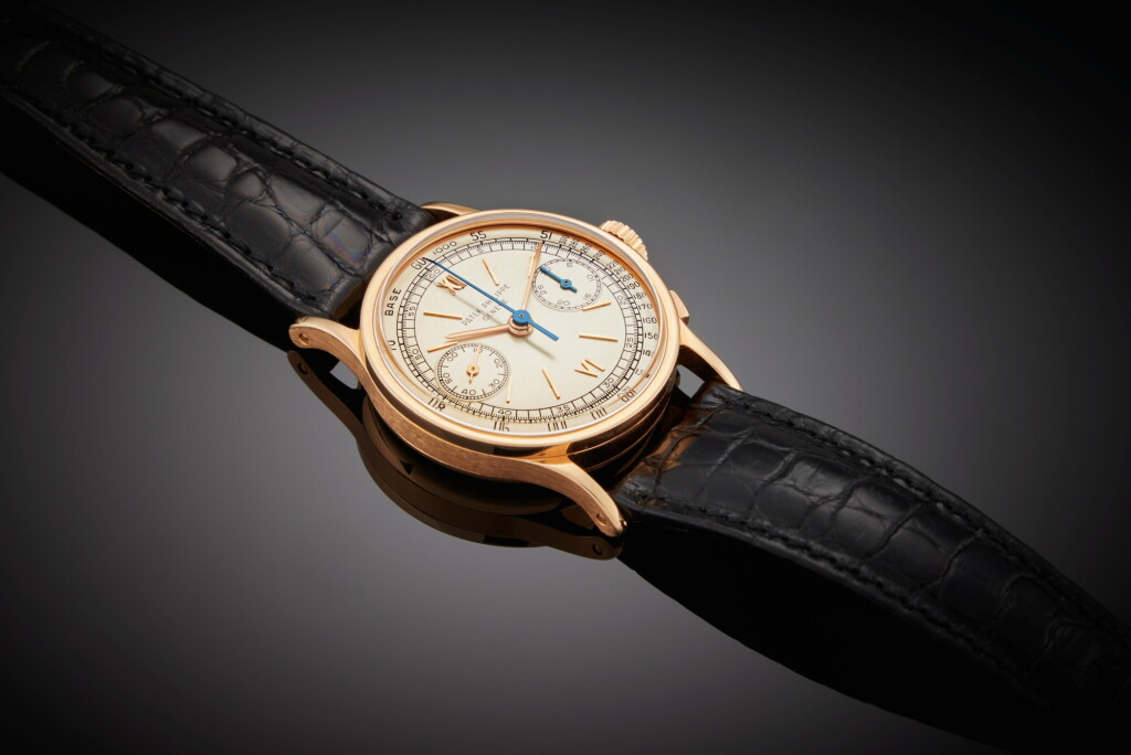View full screen - View 1 of Lot 264. Reference 533 | A pink gold chronograph wristwatch, Circa 1953.