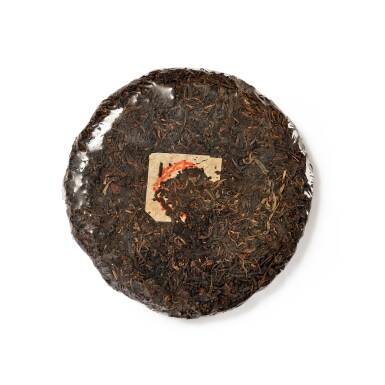 View full screen - View 1 of Lot 4. 50年代 無紙紅印圓茶 1950s Red Label Raw Tea Cake (Without Wrapping) (1 PC).