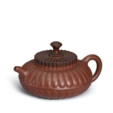 View full screen - View 1 of Lot 5053. A rare Yixing 'chrysanthemum' teapot and a wood cover, Qing dynasty, Yongzheng-Qianlong period 清雍正至乾隆 宜興紫砂菊瓣茶壺 連木蓋.