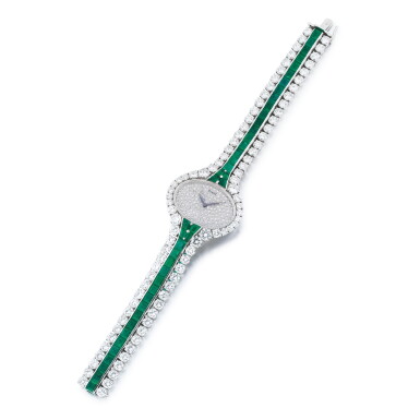 View full screen - View 1 of Lot 862. Lady's emerald and diamond bracelet watch.