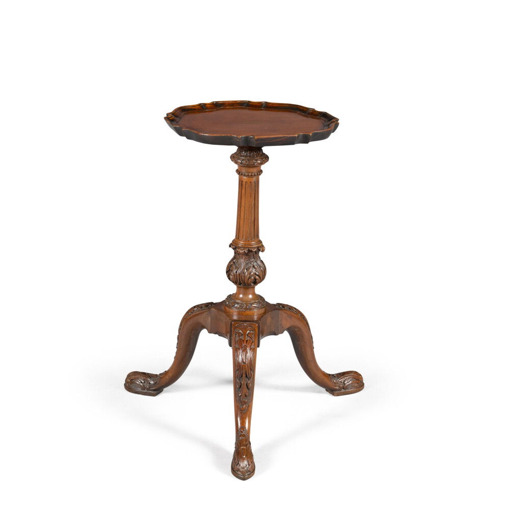 View full screen - View 1 of Lot 71. A George III carved mahogany tripod table.