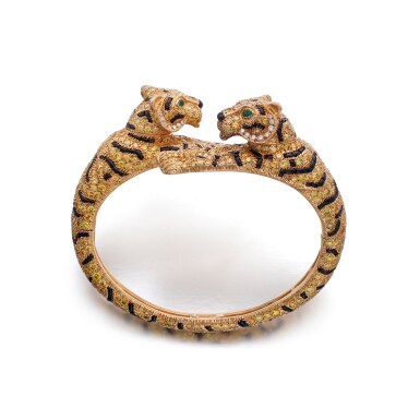 View full screen - View 1 of Lot 312. Emerald, onyx and diamond bangle 'Tiger' | 卡地亞 祖母綠、縞瑪瑙及鑽石 'Tiger' 手鐲.