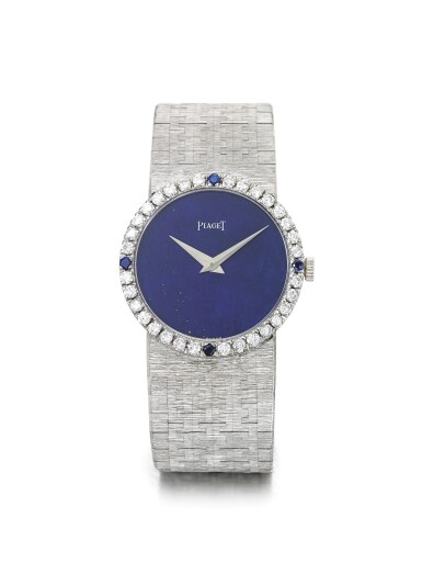 View full screen - View 1 of Lot 128. PIAGET | REF 9706 A6, A WHITE GOLD DIAMOND AND SAPPHIRE-SET BRACELET WATCH WITH LAPIS LAZULI DIAL CIRCA 1960.