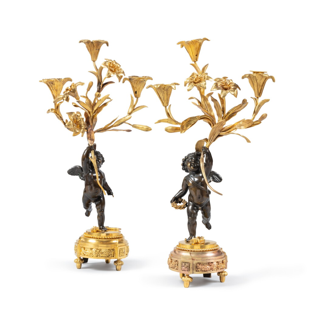 View full screen - View 1 of Lot 72. A pair of gilt bronze candelabras, Louis XVI period, circa 1780 | Paire de candélabres en bronze doré, d’époque Louis XVI, vers 1780.
