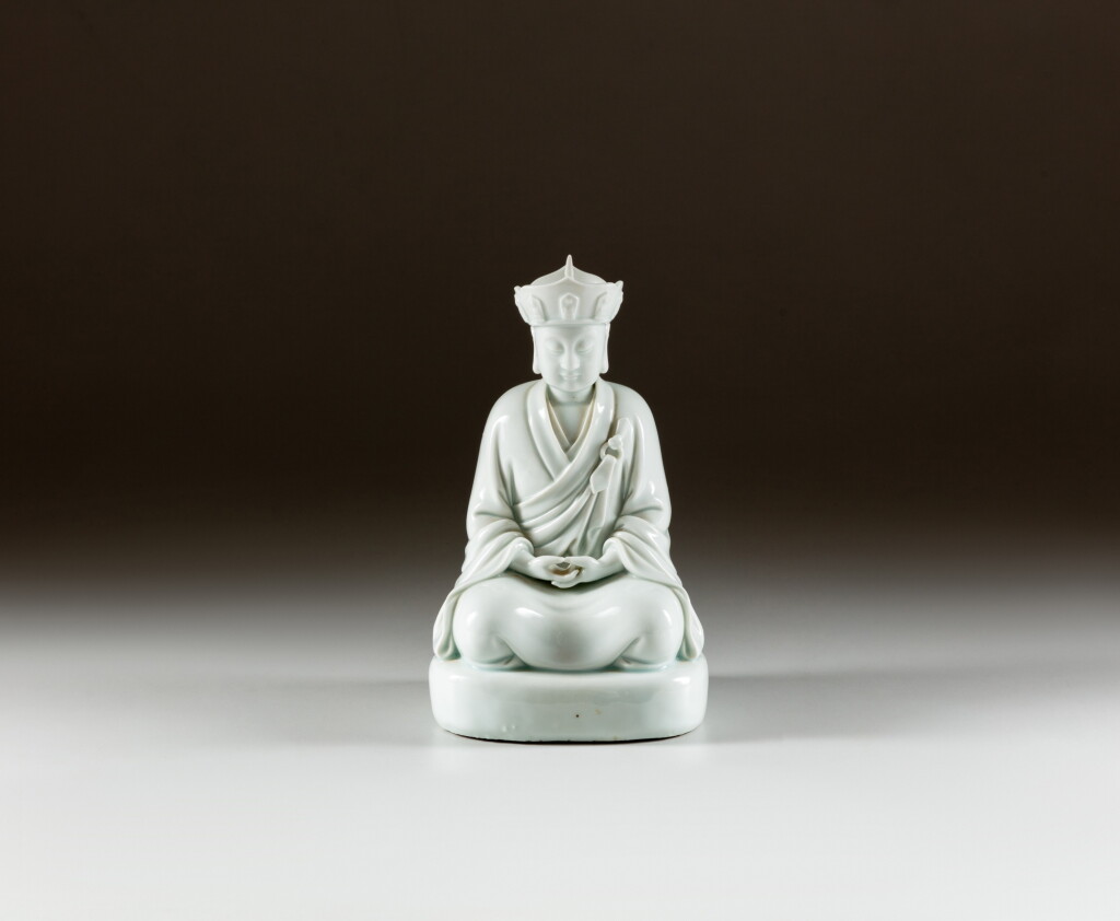 View full screen - View 1 of Lot 79. A blanc de Chine figure of a lama, Qing dynasty, 19th century | 清十九世紀 德化窰喇嘛坐像.