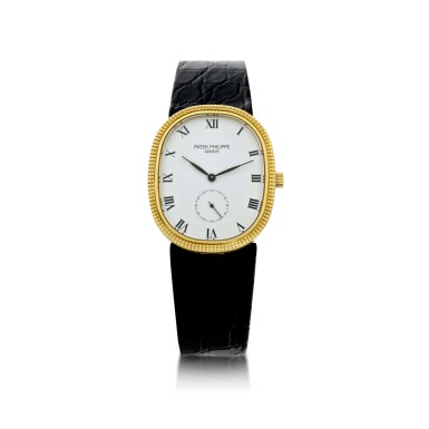 View full screen - View 1 of Lot 260. REFERENCE 3987 ELLIPSE A YELLOW GOLD OVAL WRISTWATCH, CIRCA 1988.