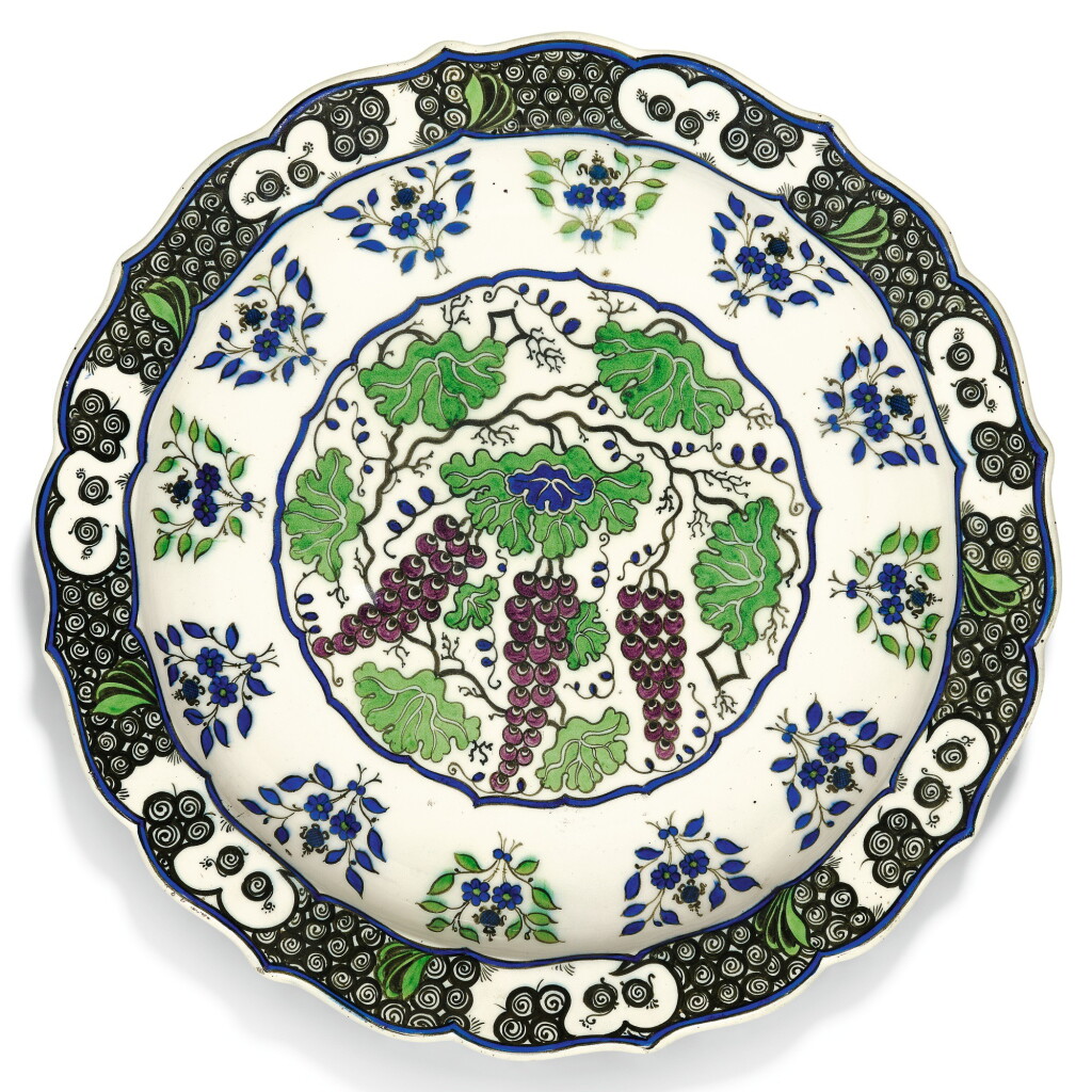 View full screen - View 1 of Lot 227. A LARGE THEODORE DECK IZNIK-STYLE POTTERY DISH WITH GRAPES, FRANCE, 19TH CENTURY.