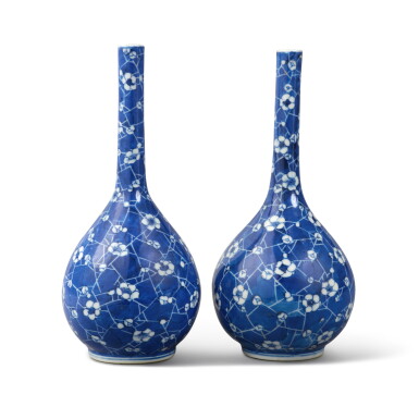 View full screen - View 1 of Lot 48. A pair of blue and white 'prunus and cracked ice' bottle vases, Qing dynasty, 19th century.