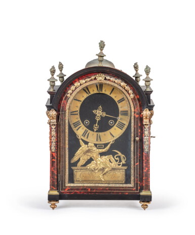 View full screen - View 1 of Lot 119. A gilt-bronze, tinted horn, brass and blackened wood clock, Louis XIV, circa 1700 | Pendule religieuse en bois noirci, laiton et corne teintée d'époque Louis XIV, vers 1700.