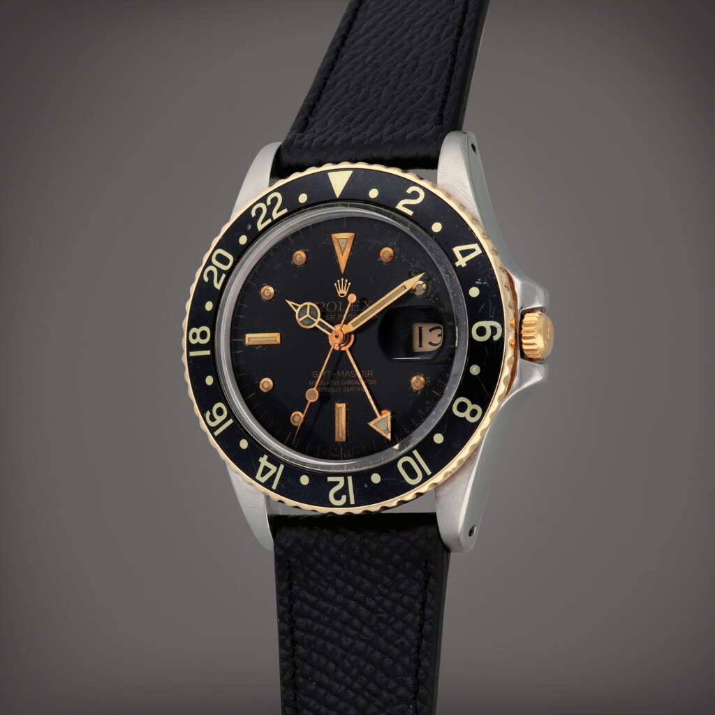 View full screen - View 1 of Lot 186. GMT-Master 'Nipple Dial', Reference 1675 | A stainless steel and yellow gold dual time zone wristwatch with date | Circa 1978.