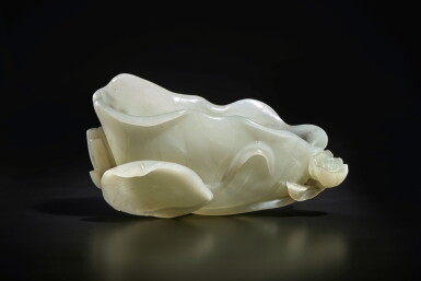 View full screen - View 1 of Lot 650. A white jade lotus leaf-form washer, Qing dynasty, 18th century | 清十八世紀 白玉荷葉形洗.