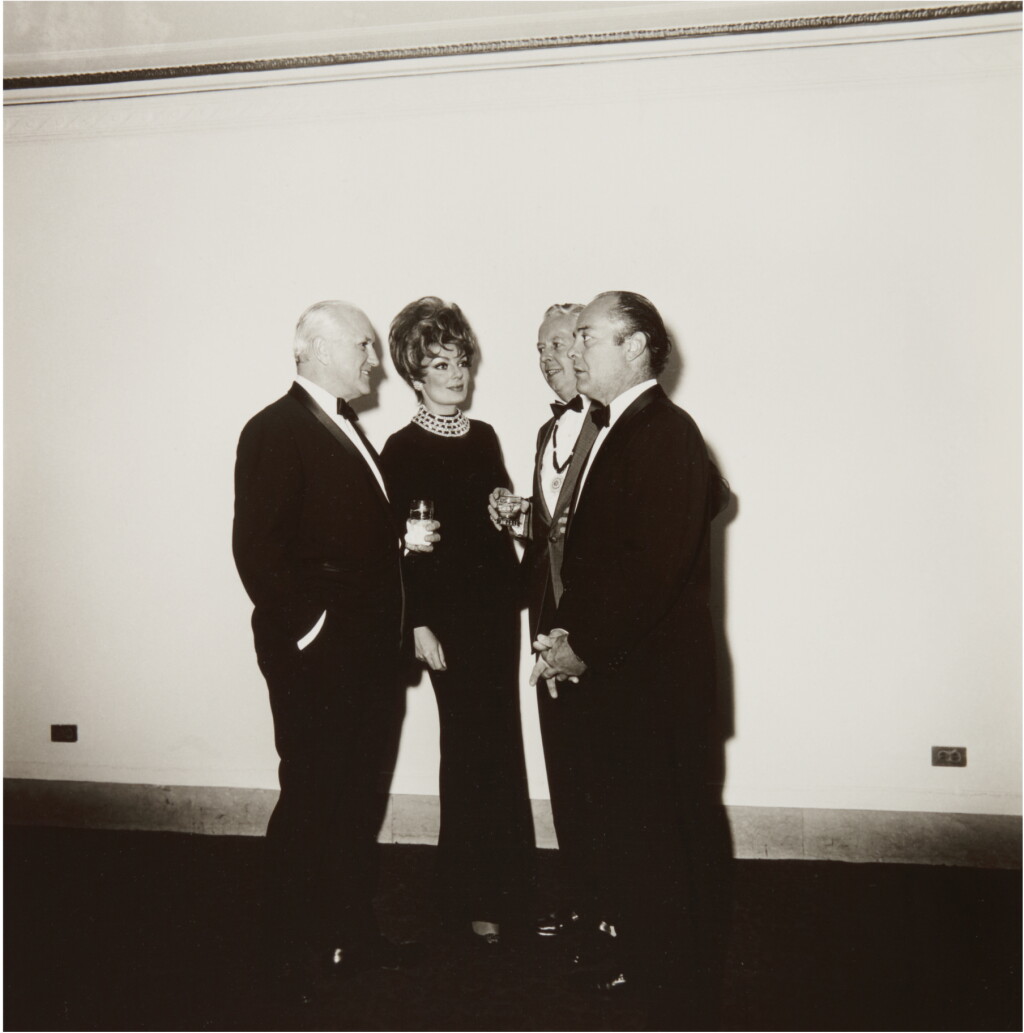 View full screen - View 1 of Lot 11. DIANE ARBUS | ‘FOUR PEOPLE AT A GALLERY OPENING, N.Y.C.’.