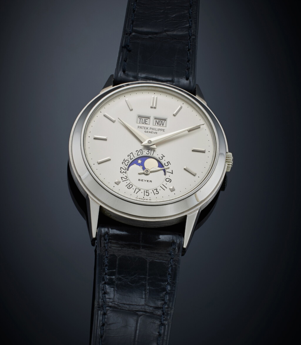 View full screen - View 1 of Lot 22. Reference 3448 ‘Padellone’ | Retailed by Beyer: A white gold automatic perpetual calendar wristwatch with moon phases, Made in 1974.